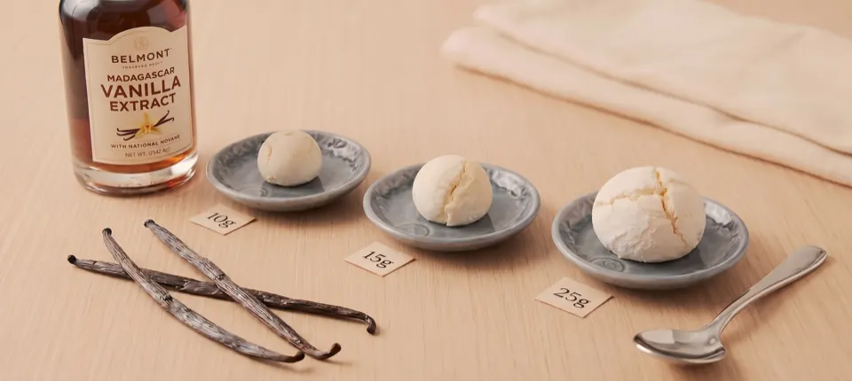 Vanilla GrahamBall sizes shown as 10g, 15g, and 25g on small plates beside vanilla beans.